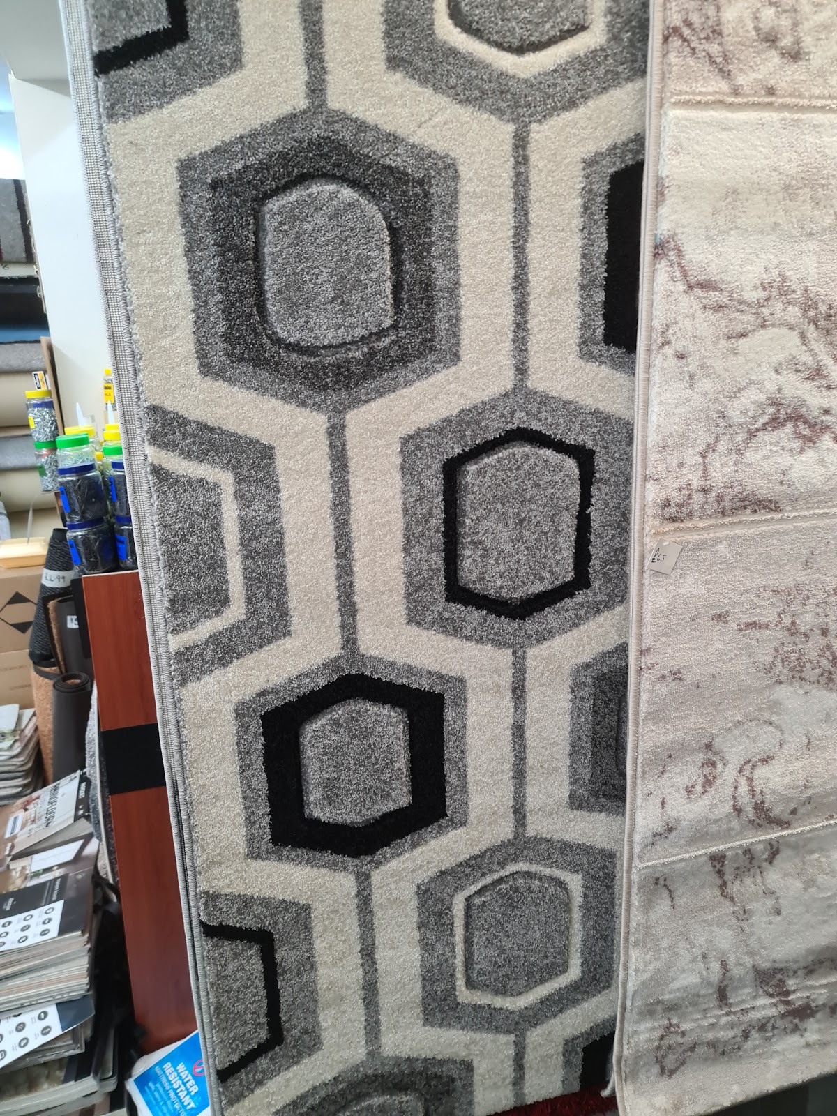 Grey patterned rug in the Wigan Carpets showroom